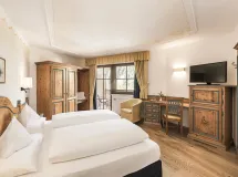 Familiensuite Sacun mit Balkon und Dolomitenblick - Hotel Ansitz Jakoberhof