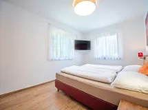 Vier-Raum-Wohnung mit Garten - Apartments Cësa Ploner