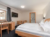 Doppelzimmer standard mit Blick auf die Geislerspitzen - Monte Pana – Dolomites Hotel