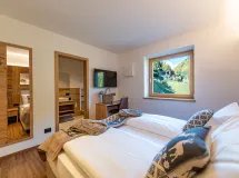 Ferienwohnung mit 2 Schlafzimmern und Panoramaterrasse - Apartments Luech da Perteut Panorama & Wellness - Bauernhof